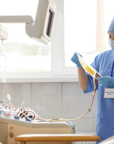 Nurse working with dropper