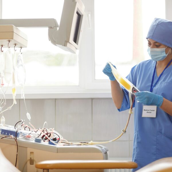 Nurse working with dropper